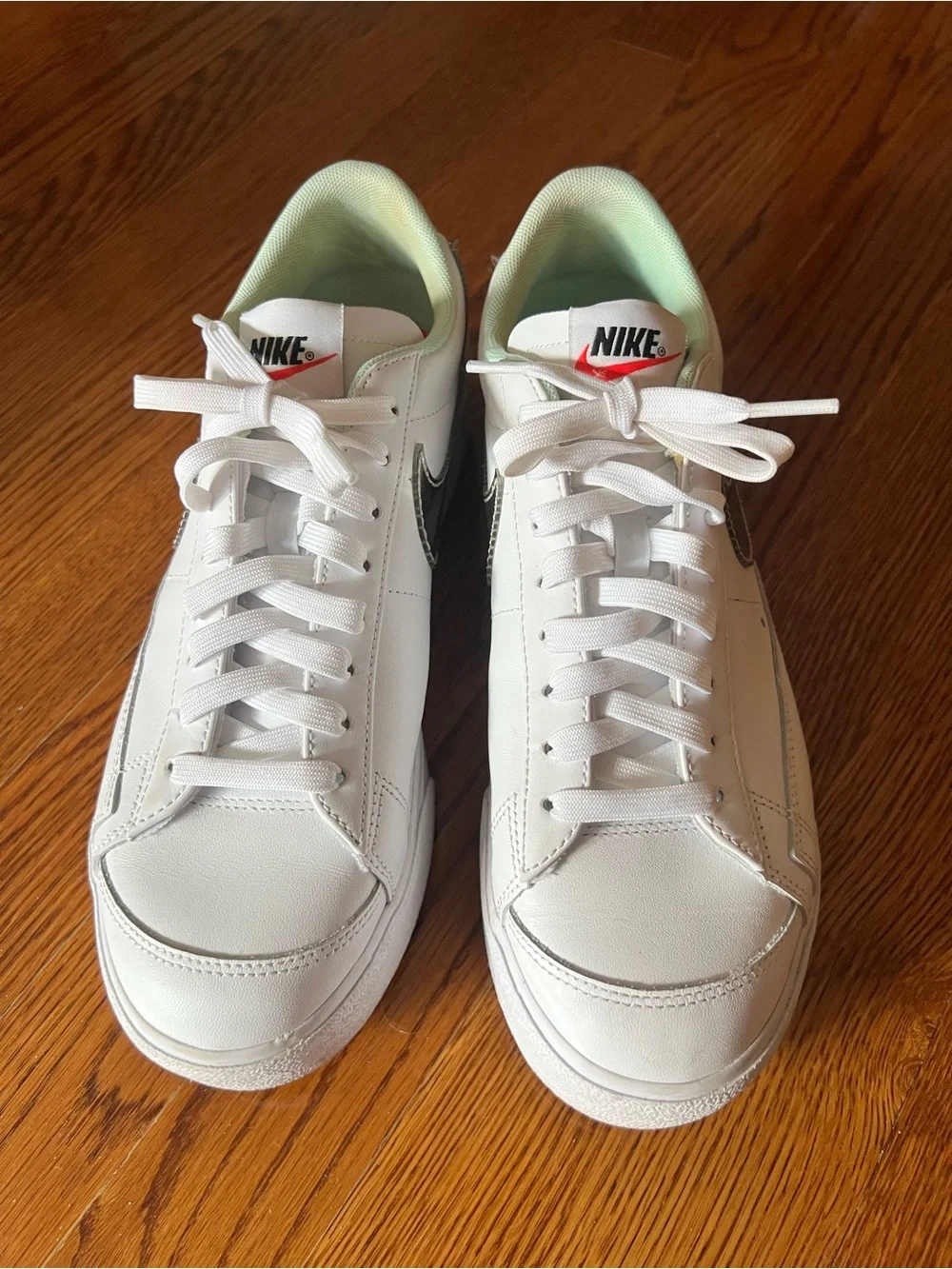 Nike Women’s Blazer Low Platform White Sneakers with Metallic Silver Swoosh